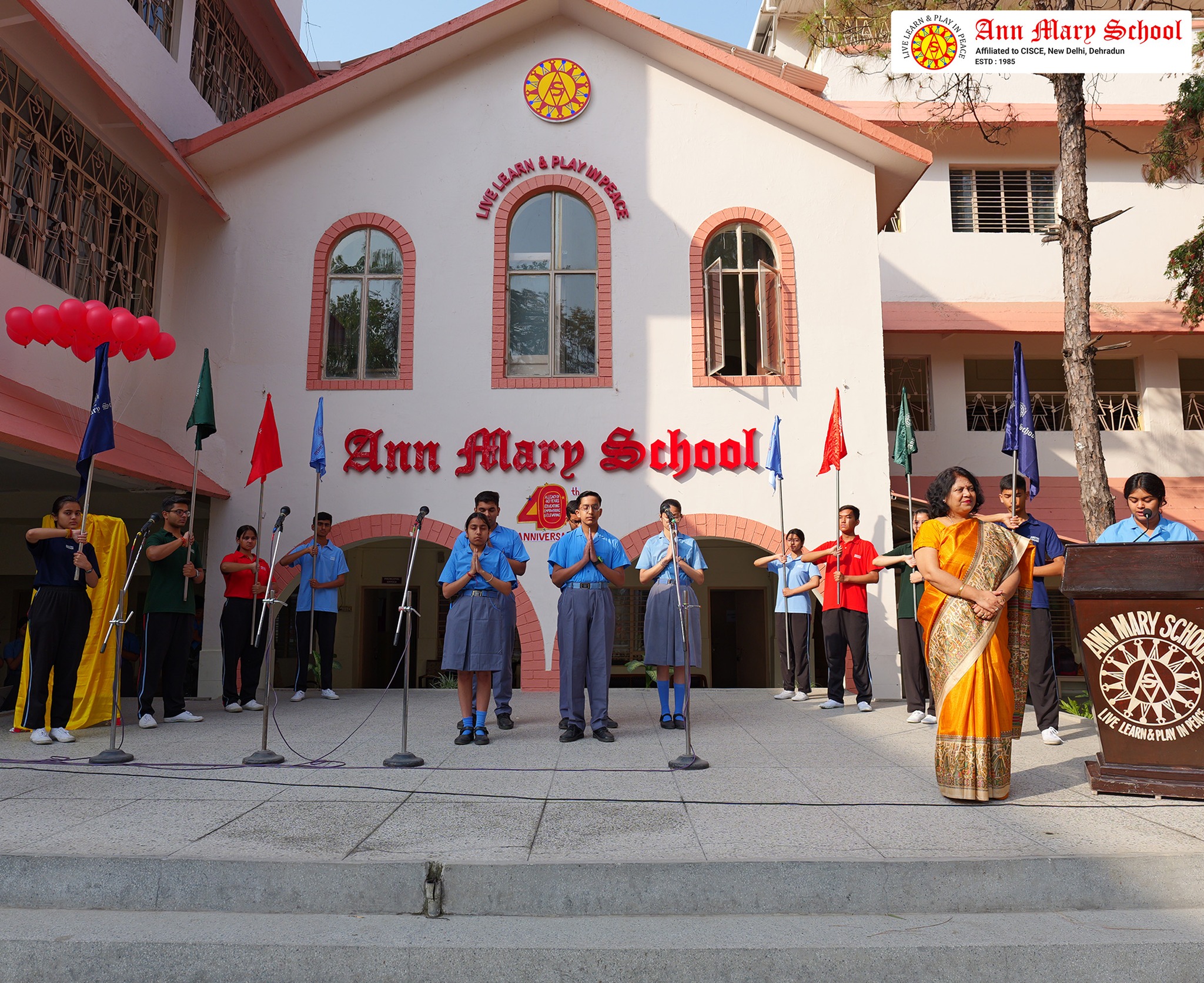 Ann Mary School Main Building - Students in Assembly with School Facade